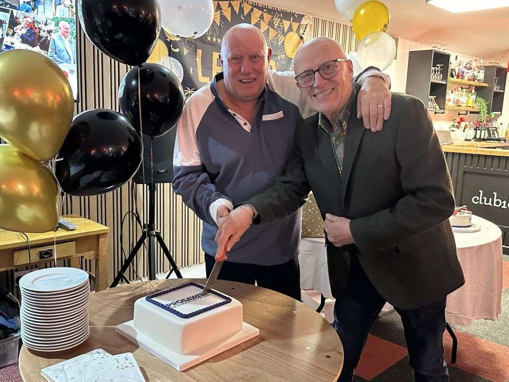 Bob & Jeff cutting the cake